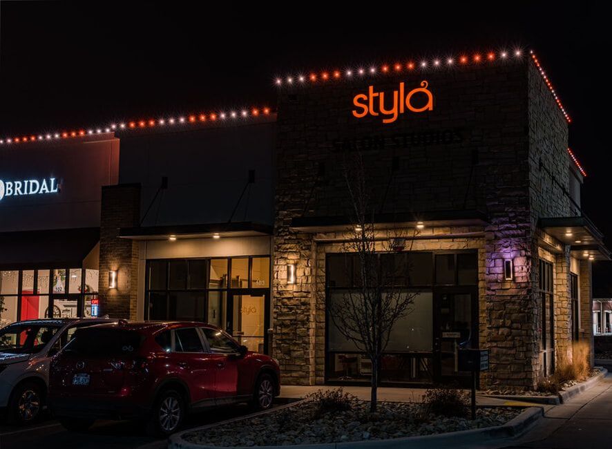 Business exterior lit at night