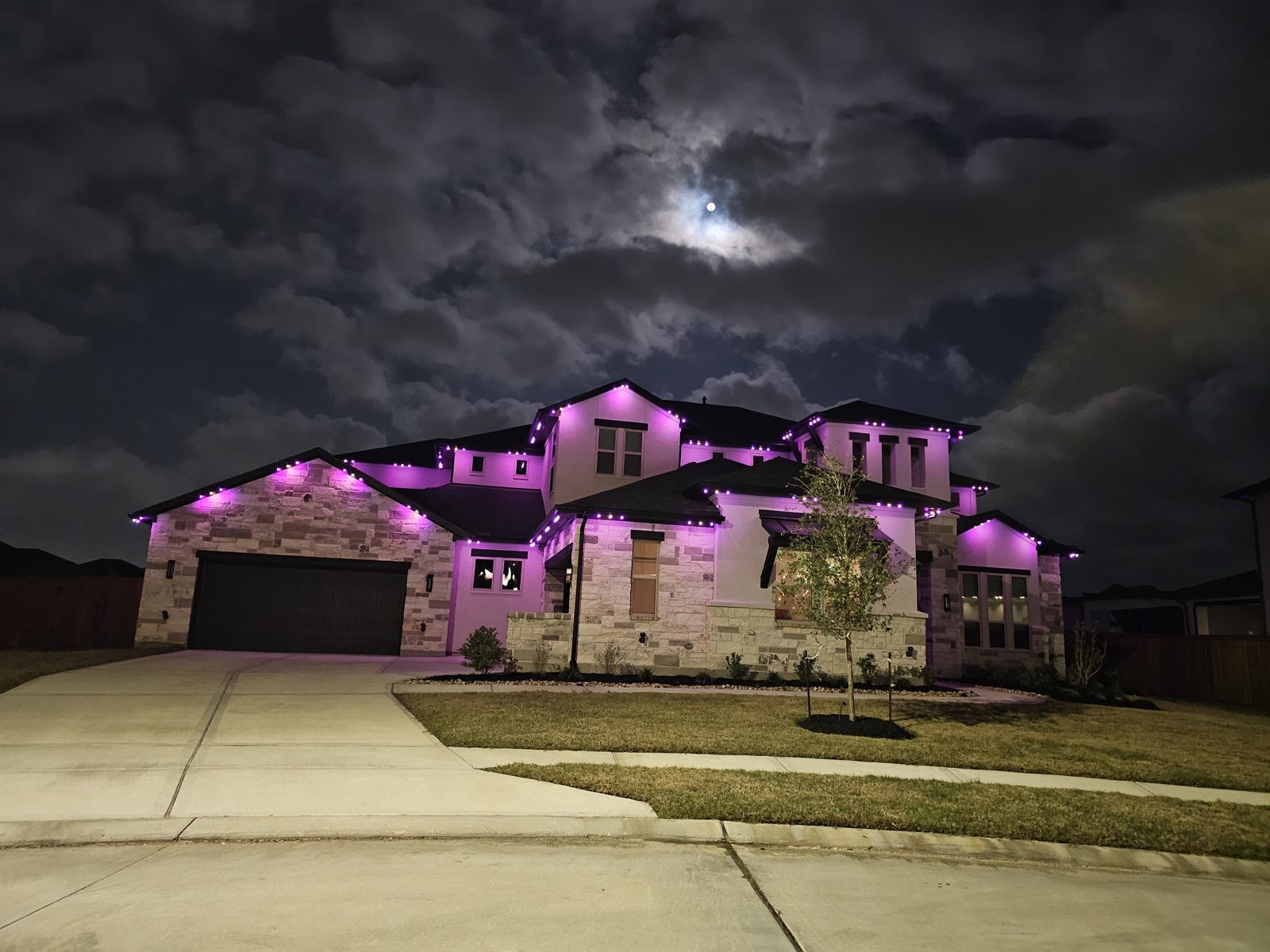 Home with permanent accent lighting in warm purple